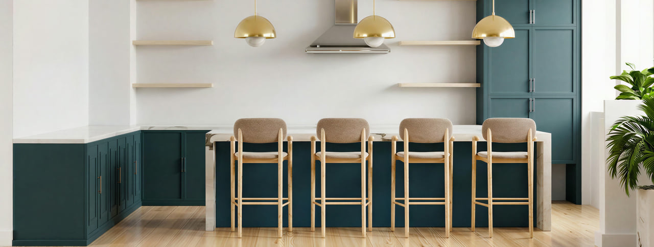 Bright multifamily kitchen with teal cabinets and island seating
